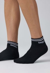 SNOCKS UNISEX czarny