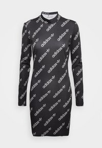 Robe noire à manches longues avec un col montant, ornée de motifs répétitifs du logo Adidas blanc et du trèfle sur un tissu lisse.