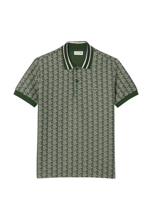 Groene polo met een geometrisch patroon, ribbelkraag met witte strepen en een klein logo op de borst. Gemaakt van een katoenmix.