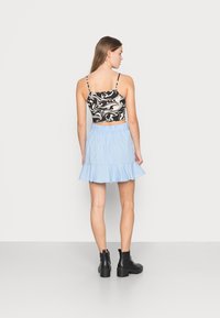 Monki Minissaia - blue solid