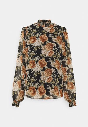 Blouse noire à manches longues avec col haut volanté, poignets élastiques et motif floral orange, beige et vert sur l'ensemble.