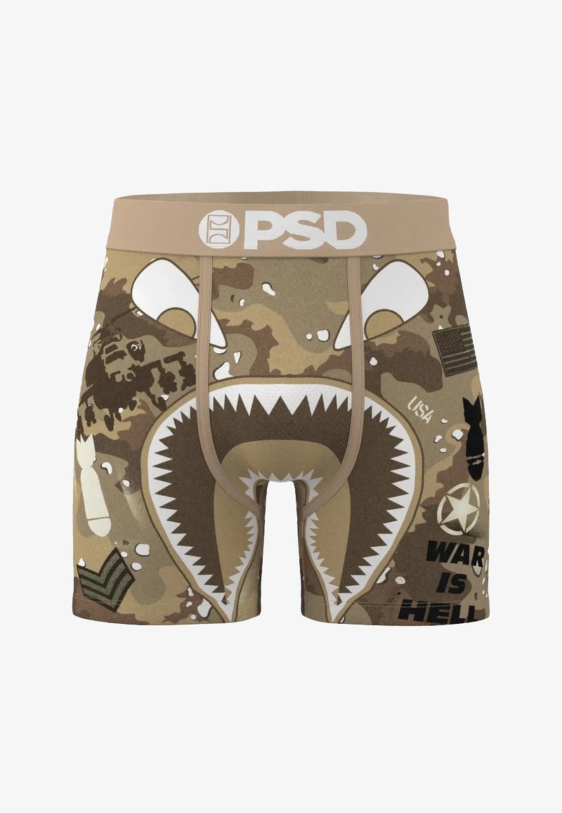 Calzoncillos bóxer para hombre con patrón camuflado en beige y marrón, con diseño de boca de tiburón blanca, cintura con logo y detalles gráficos.