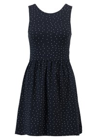 Robe sans manches bleu marine en coton avec un corsage ajusté et une jupe évasée, ornée de pois blancs et d'un col rond.