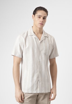 PuroEgo, Camisa - piedra