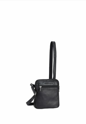 Sac bandoulière en cuir noir avec poche avant zippée et sangle réglable, compact et de forme rectangulaire.