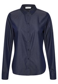 Camisa de botones azul marino en un tejido suave, con un cuello clásico, mangas largas y botones en la parte delantera.