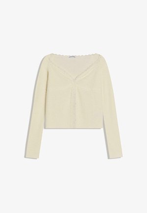 Kremfarvet, ribstrikket top med lange ærmer, bølget kant og blonder, med tætsiddende silhuet og V-udskæring.