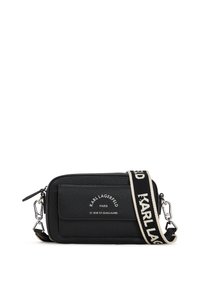 Black leather crossbody bag with zipper closure, textured surface, front pocket, and adjustable strap featuring logo details.