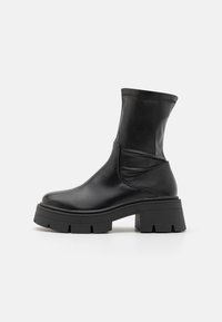 NOELIA - Platform ankle boots - black