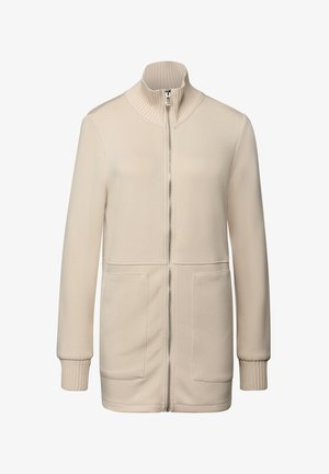 Beige op de rits jack met ribgebreide kraag, lange mouwen en twee voorzakken. Glad textuur met een casual ontwerp en een getailleerde pasvorm.