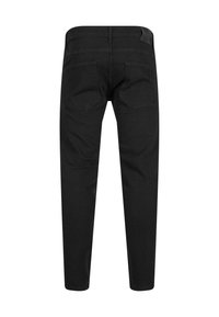 Jean en denim noir avec une coupe slim, design à cinq poches et un dos uni. Présente une texture lisse et une taille standard.
