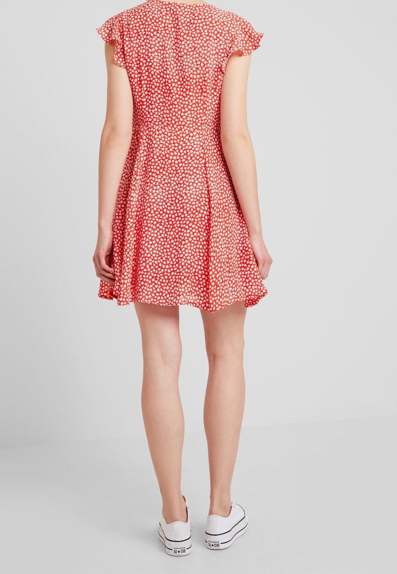 strapless open back dress Katie Midi Dress in Red Milos Floral Cream main image 0