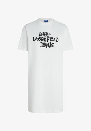Camiseta blanca de algodón con mangas cortas, que presenta un logo en spray negro "KARL LAGERFELD JEANS" en el pecho.