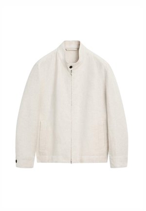 Lichtbeige jas met ritssluiting, opstaande kraag, twee voorzakken en knoopdetails op de kraag en manchetten, afgebeeld op een witte achtergrond.