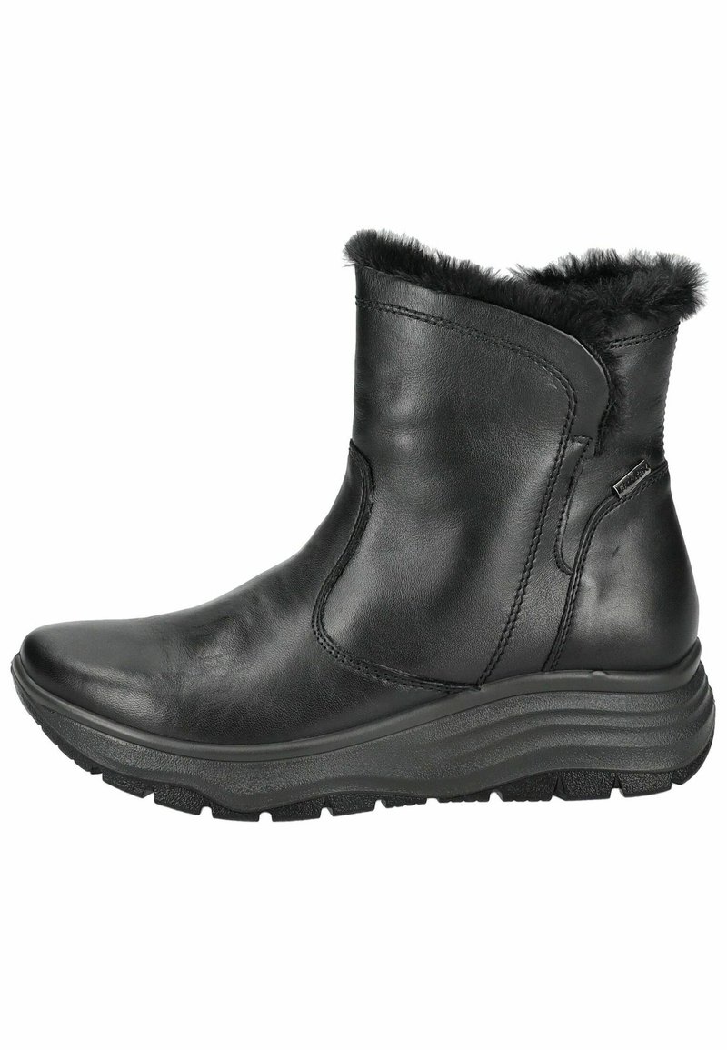 Botín de cuero negro hasta el tobillo con forro de pelo sintético, puntera redondeada, paneles laterales elásticos y suela de goma texturizada. Exterior liso e impermeable.