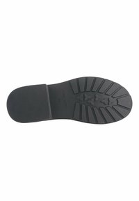 Black rubber shoe sole with a textured pattern, including grooves and rounded edges. Marked with size 37 and brand name.