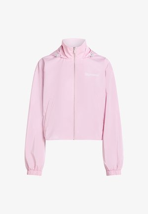 Light pink zip-up hooded jacket with elastic cuffs and front pockets, featuring small white text on left chest.
