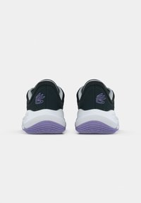 Black athletic shoes with a white sole and purple accents, featuring a smooth texture and rounded shape, designed for comfort and performance.