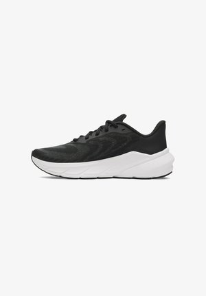 Black athletic shoe with a textured mesh upper, contrasting white midsole, rounded toe, and flat black outsole; features lace-up closure.