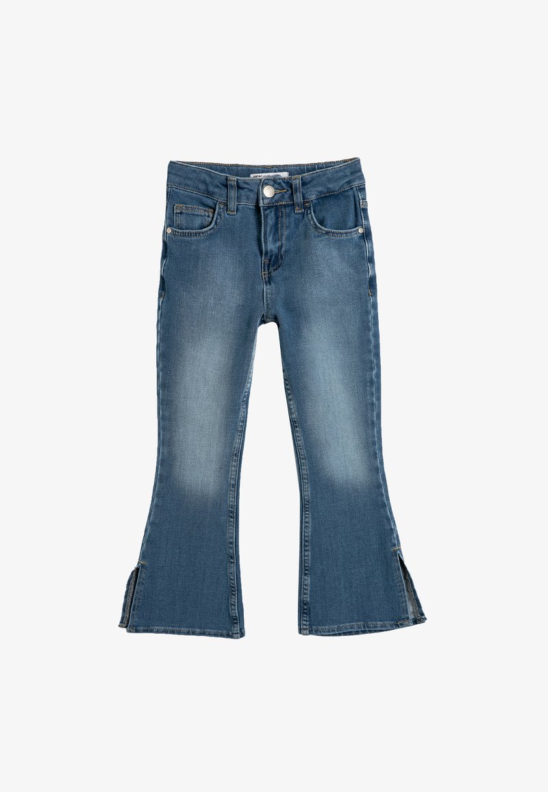 Jeans i medelblått denim med utsvängd bendesign, utrustad med knappstängning framtill, sidofickor och slitsar i sidorna nära fållen.