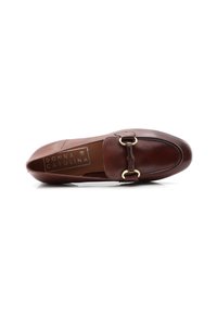 Brown leather loafer with a round toe, gold-tone hardware detail, and textured accent. Features a smooth finish and slip-on design.