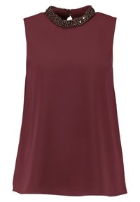 Top sans manches bordeaux avec un col rond, doté d'un col en perles. Fabriqué en tissu lisse avec une silhouette fluide.