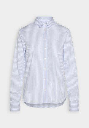 Light blue and white striped button-up shirt, featuring a classic collar, long sleeves, and a curved hem. Cotton fabric with smooth texture.