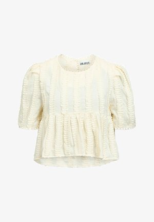 Cremefarbene, kurzärmlige Bluse mit strukturierter Oberfläche, Puffärmeln, Peplum-Saum und zierlicher, gewellter Spitze entlang des Ausschnitts und der Bündchen.