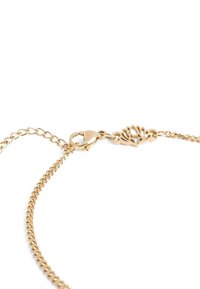 Gold-toned chain necklace featuring a lotus-shaped accent and a lobster clasp. The chain has a smooth, polished finish with linked segments.