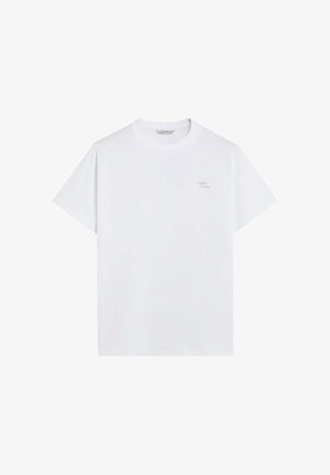 Weißes Baumwoll-T-Shirt mit kurzen Ärmeln und Rundhalsausschnitt. Dezentes Markenlogo in Hellgrau auf der linken Brust.