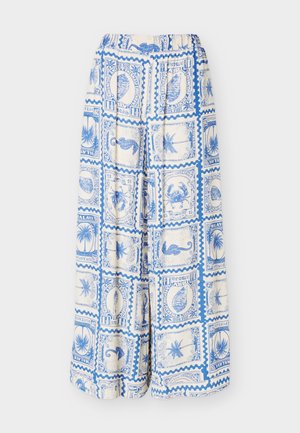 Wide-leg pants with elastic waistband, featuring blue vintage postage stamp prints with seashells, palm trees, crabs, and seahorses on white fabric.