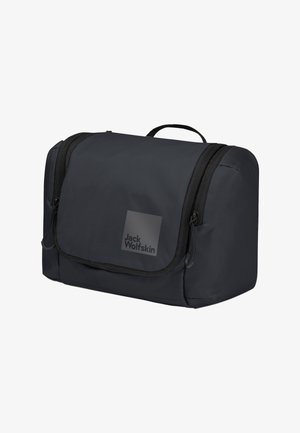 Zwart rechthoekige Jack Wolfskin toilettas met voorflap, zijvakken met rits en een handvat aan de bovenkant.