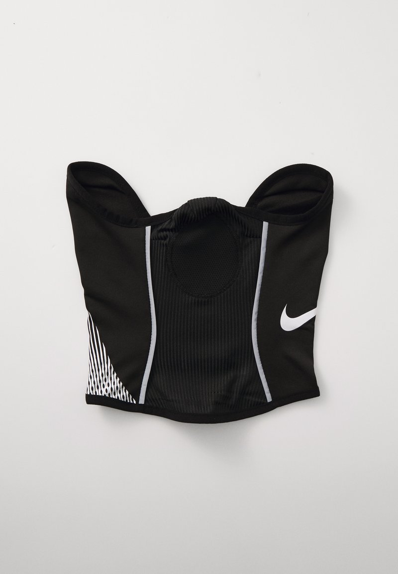 Soutien-gorge de sport noir présentant une découpe ronde, des panneaux texturés et des lignes d'accent blanc ; logo Nike affiché sur le côté avant gauche.
