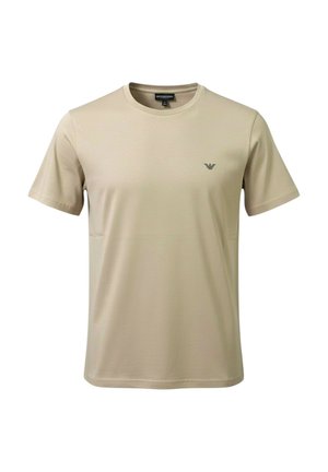T-shirt beige a maniche corte con scollo rotondo e piccolo logo nero sul petto a sinistra, mostrata su sfondo bianco semplice.