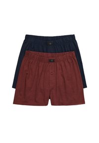 Due paia di boxer da uomo; uno blu navy e uno bordeaux. Entrambi sono realizzati in tessuto morbido con vita elasticizzata e dettagli con un singolo bottone nella patta.