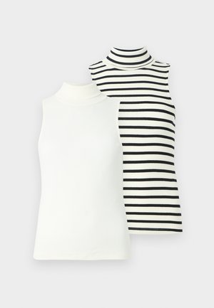 Two sleeveless turtlenecks: one solid white, one white with black horizontal stripes. Both are ribbed and fitted.