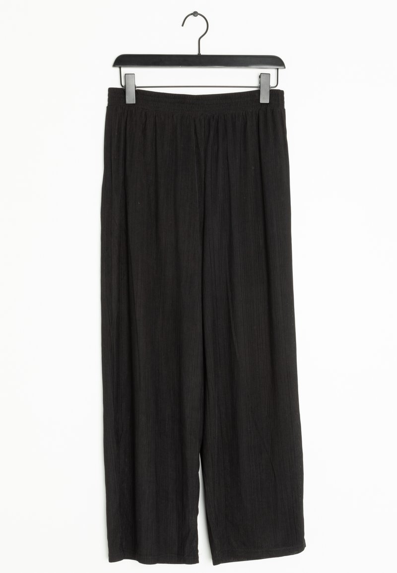 Zwarte wijde broek van textuurstof, met een elastische tailleband en een vloeiende stijl, tentoongesteld aan eenhanger.