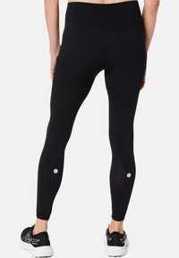 ASICS ROAD SEAMLESS - Tights - performance black