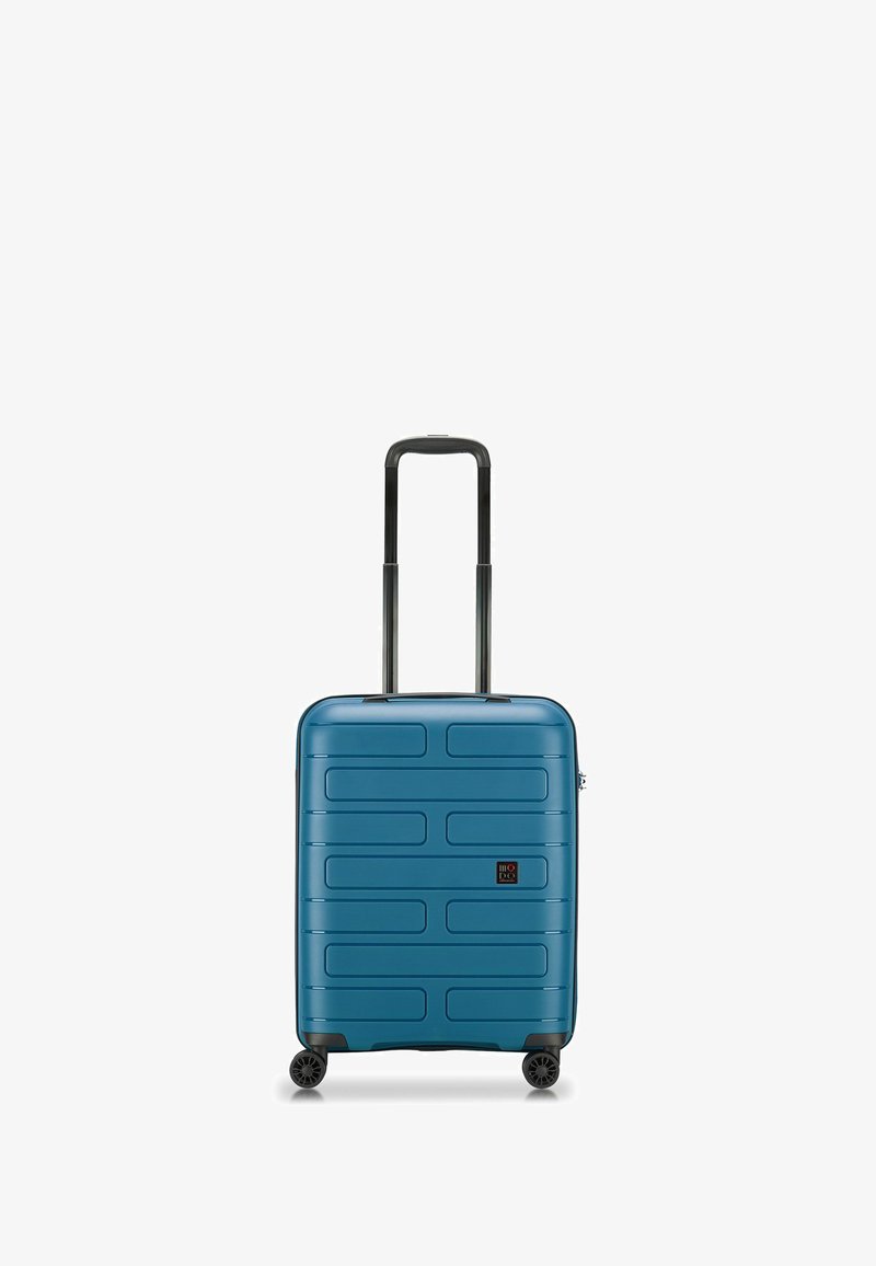 Valise rigide en teal avec un design texturé, poignée rétractable et quatre roues pour une maniabilité optimale. Comprend un accent de logo.