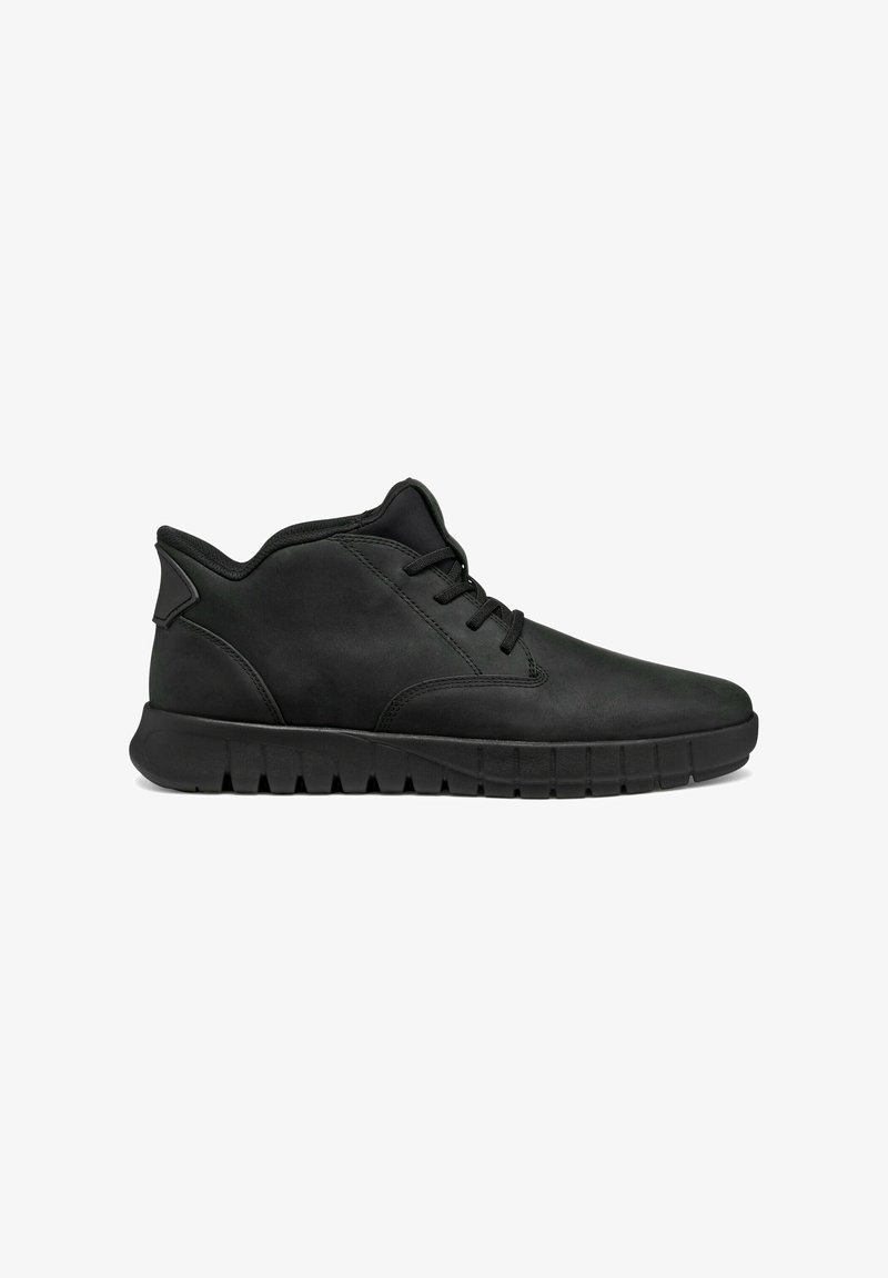 Black ankle boots with smooth leather material, laces, padded collar, and textured rubber sole featuring grooves for traction.