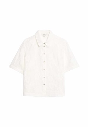 Camicia bianca a maniche corte con motivo floreale, davanti con bottoni e colletto a punta. Il tessuto sembra strutturato e leggero.