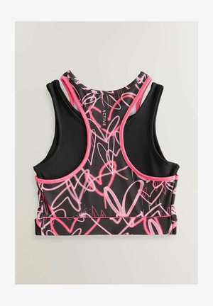 Sportos melltartó fekete alappal, rózsaszín absztrakt szívmintákkal, sportos fazonnal, széles pántokkal és lélegző anyaggal.