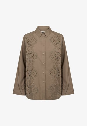 Barna gombos ing hosszú ujjakkal és virágos lyukacsos hímzéssel az elülső paneleken és szegélyeken.