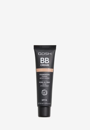 Tube de crème BB GOSH en noir avec une bande bronze clair. Le texte comprend "Base de fond de teint hydratante" et SPF 15. Capacité de 30 ml.