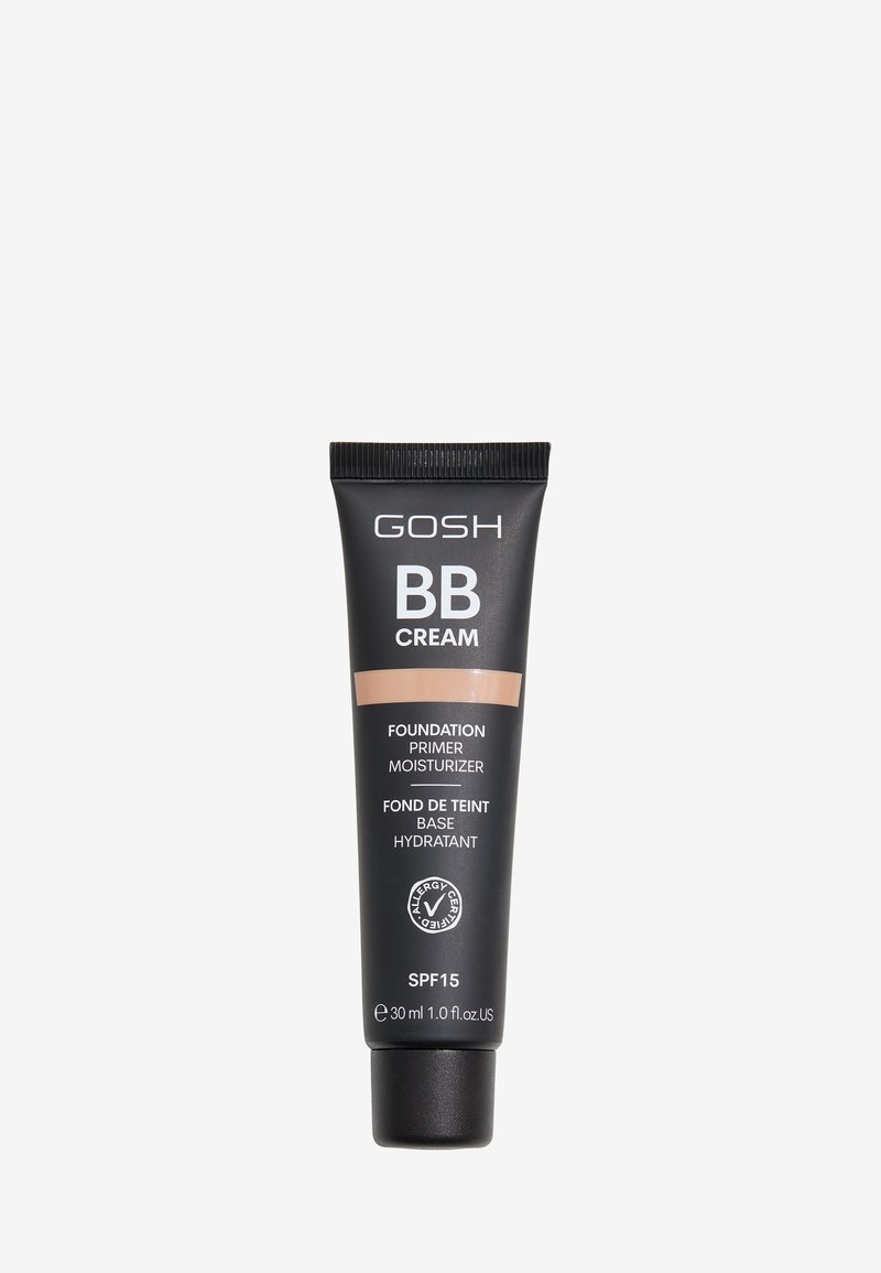 GOSH BB Cream tube in het zwart met een licht bronzen band. De tekst bevat "Foundation Primer Moisturizer" en SPF 15. Capaciteit van 30 ml.