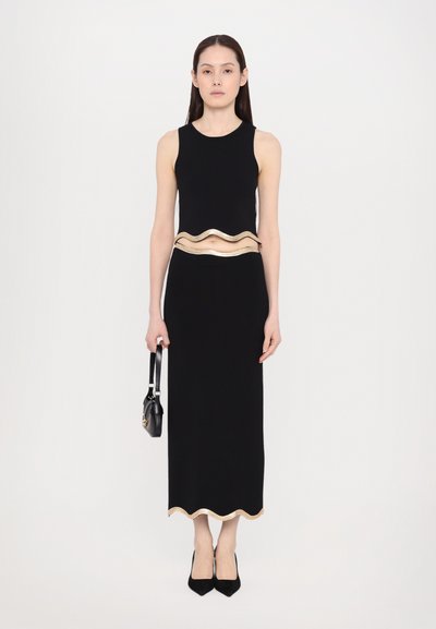 sandro JUPE AVEC FOURNITURE METAL - Pencil skirt - noir