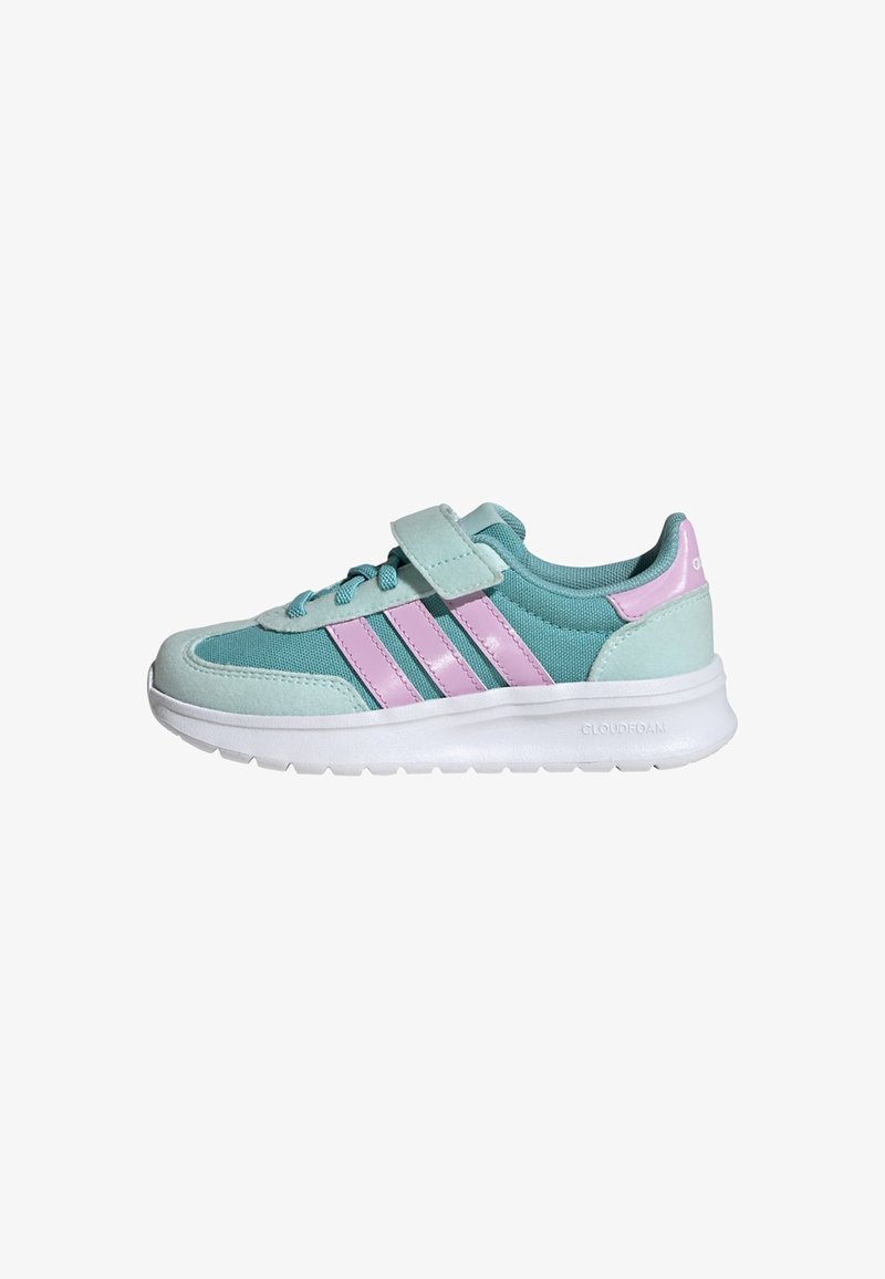 Light blue athletic shoe featuring a velcro strap, pink stripes, foam sole, and a textured upper material. Cloudfoam branding on the side.