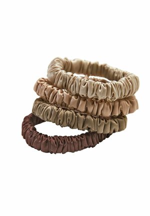 Set of four fabric hair scrunchies in various neutral colors: light beige, tan, olive, and dark brown. Textured, gathered design.