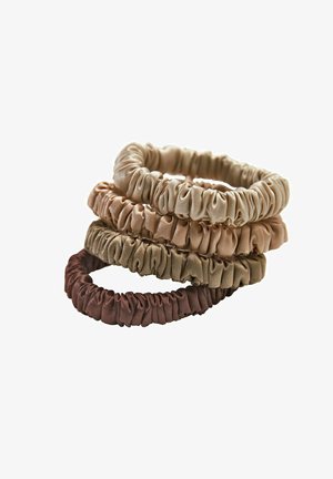 Set of four fabric hair scrunchies in various neutral colors: light beige, tan, olive, and dark brown. Textured, gathered design.