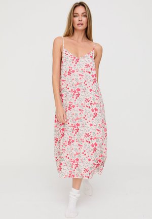 Florales Midikleid mit hellem beigen Hintergrund, roten und grauen Blumenmustern, Spaghettiträgern und einer fließenden Silhouette.